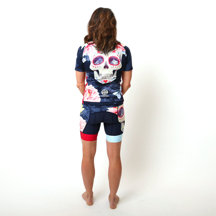 Model wearing Boneshaker Women's Short-Sleeved Biking Kit Back